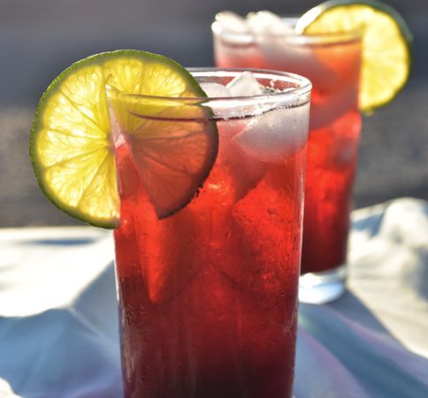 cold iced tea drinks in glasses and pitcher in desert setting